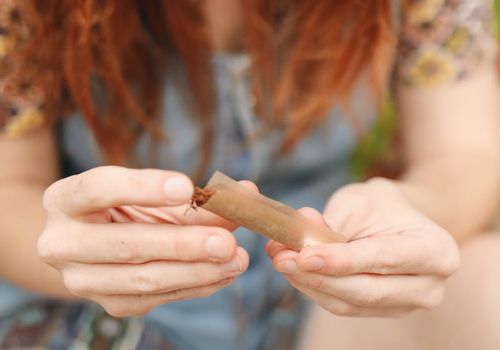 Active person outdoors doing joint rotations